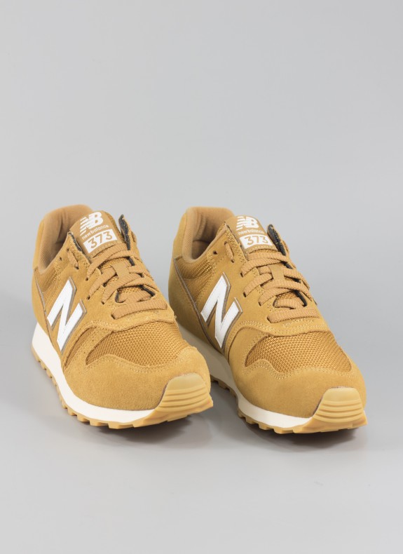 Chaussures NEW BALANCE de couleur moutarde pour homme