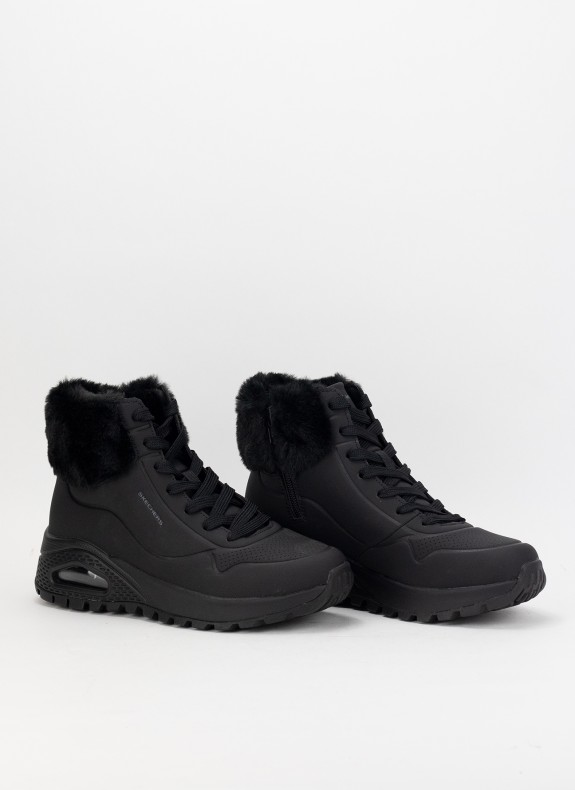 Botines SKECHERS en color negro para mujer