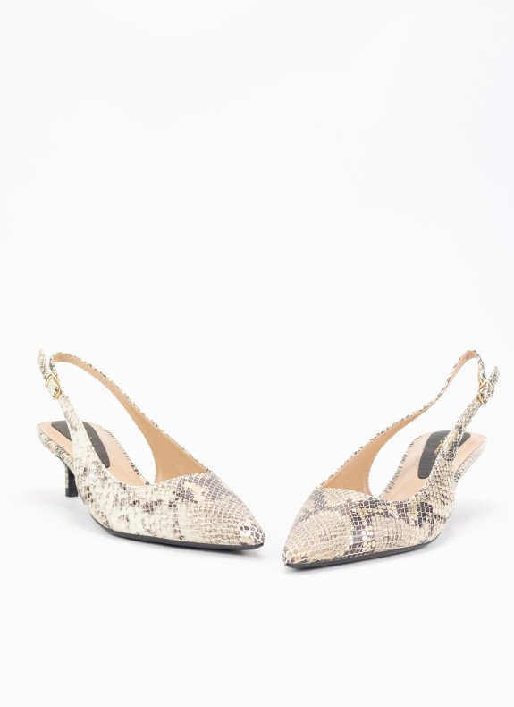 Fallen Schuh mit Frauen stilvolle Schlange