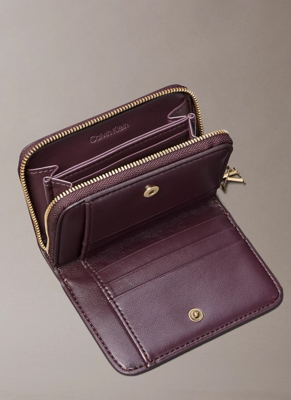 CK PULLER MEDIUM FLAP ZIP AROUND