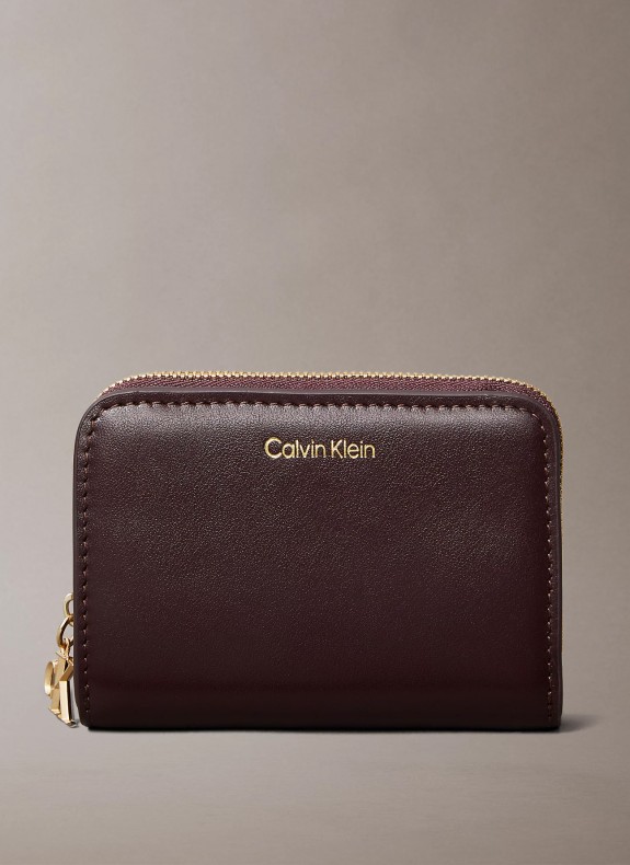 CK PULLER MEDIUM FLAP ZIP AROUND