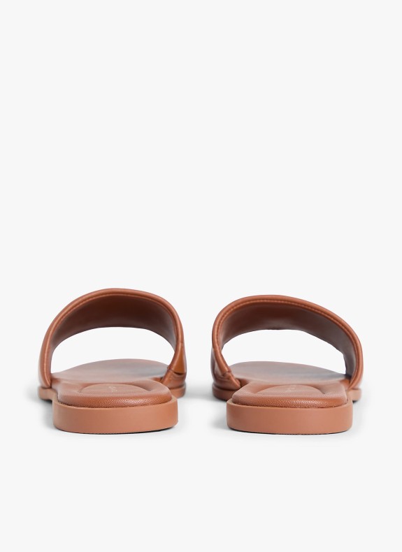 Sandálias Tommy Hilfiger Th Logo Hardware Leather Mule em cor de couro para mulher